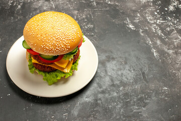 front view tasty meat burger with vegetables on grey background sandwich fast-food bun