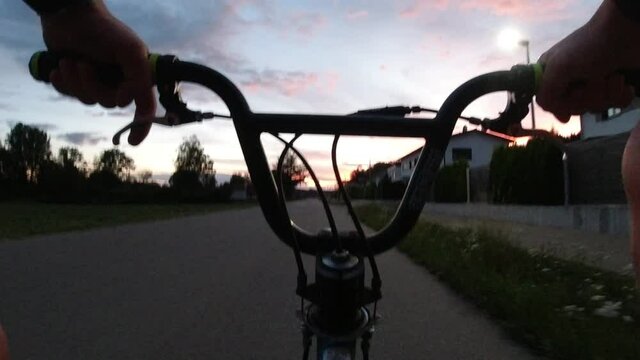 FPV riding a BMX at dusk