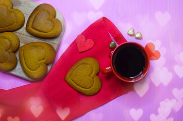Valentine's day or mother's day greeting card, cup of black coffee top view and homemade heart...