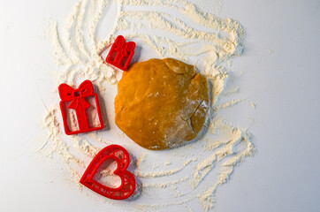 valentine's day homemade baking food concept, raw dough and cutter dish heart shape for making...