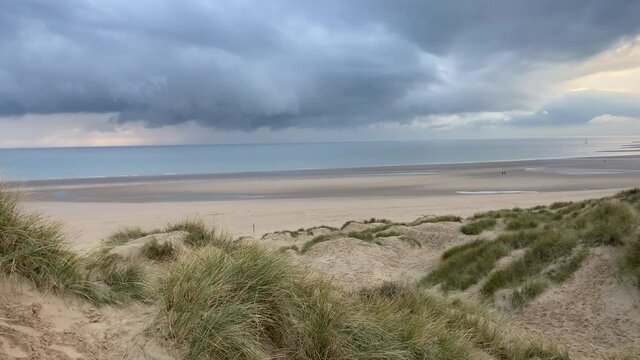 Camber sands beach, Rye, East Sussex UK, Camber is a flat sandy beach with giant sand dunes South coast England and popular with tourists and daytrippers in  only sand dune system in East Sussex, Uk