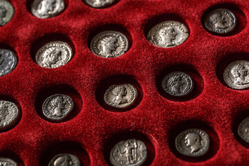 Numismatics.Authentic silver denarius, antoninianus of ancient Rome. A collector holds an old coin.Ancient coin of the Roman Empire