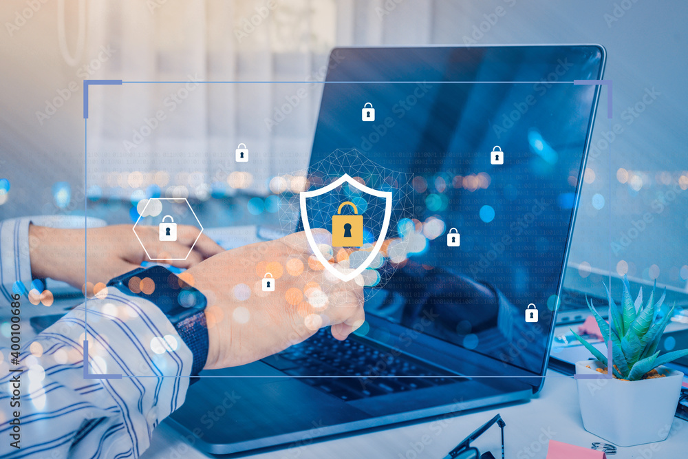 Poster person using a laptop computer with data protection, cyber security secure, information safety and e