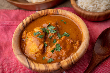 butter chicken curry with naan and basmati rice