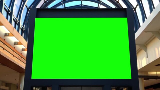 Green billboard for your ad inside shopping mall