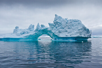 Iceberg arch in Disko Bay, Ilulissat, West Greenland