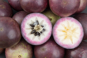 Purple star apple fruit or cainito fruit background, Chrysophyllum Cainito