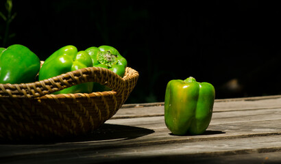 bell peppers in a basket and a bell pepper alone