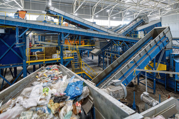 Waste sorting plant. Many different conveyors and bins