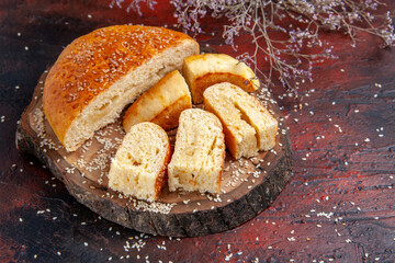 front view sweet pastry sliced in pieces on dark background pie cake dough
