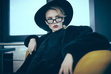 lady in black fur coat