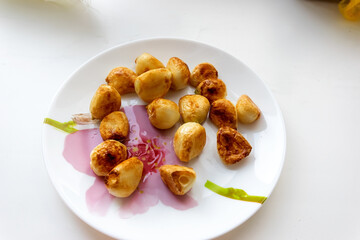 dish of shrimps, macaroons, garlic and herbs