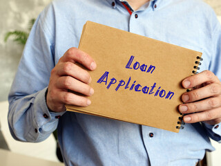 Business concept meaning Loan Application with sign on the piece of paper.