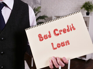 Financial concept about Bad Credit Loan with sign on the piece of paper.