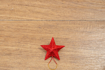 Fototapeta na wymiar Christmas postcard frame on wooden background on Star . For greeting card