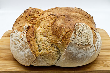 Loaf of Apulian Bread. Italian Pane Pugliese, crunchy on the outside and soft on the inside, perfect to be enjoyed with cold cuts and cheeses.

