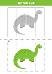 Cut and glue game for kids. Cute cartoon dinosaur.
