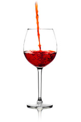 In a transparent glass, a stream of wine pours creating excitement on a white background