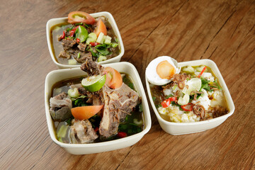Delicious Beef soup shoot on wooden table