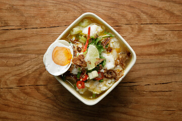 Delicious Beef soup shoot on wooden table