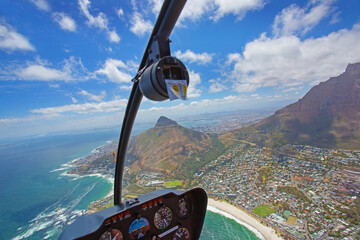 Cape Town, Western Cape / South Africa - 11/26/2020: Aerial photo of Camps Bay and Lions Head from a pilots perspective