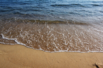 Sand beach and wave