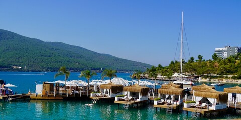 Obraz premium Bodrum, Turkey - August, 2020 Panoramic view, Rest in paradise. Beautiful tropical beach banner. Emerald Ocean. Amazing beach landscape, yachts.