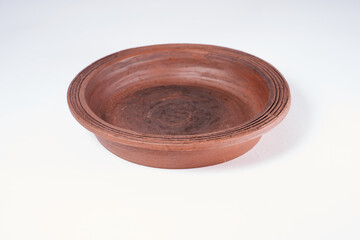 Pottery Craft, ceramic product with your own hands, made on a Potter's wheel, isolated on a white background