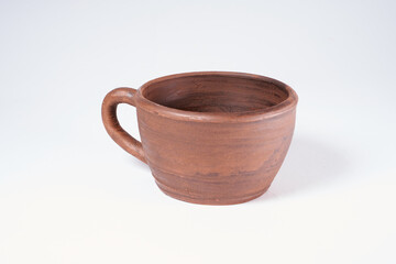 Pottery Craft, ceramic product with your own hands, made on a Potter's wheel, isolated on a white background