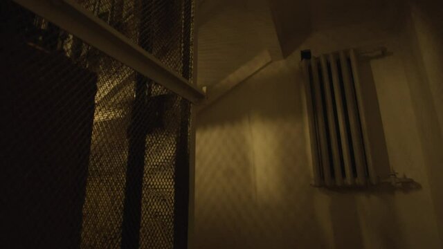 Old elevator is moving in house. Stock footage. Old lift is operated in residential building. Beautiful entrance in old house with moving vintage elevator