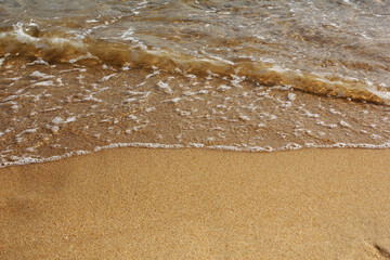 Sand beach and wave