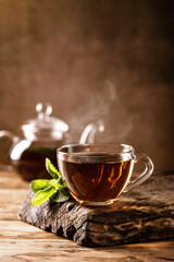 Cup of hot tea with fresh mint leaves - 400134854