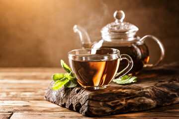Cup of hot tea with fresh mint leaves - 400134897