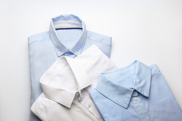 New man shirts on light background