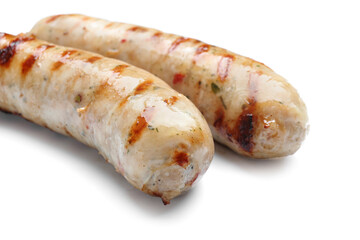 Delicious grilled sausages on white background