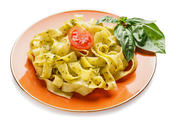 Plate with tasty pasta and pesto sauce on white background