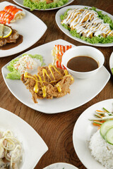 a plate of Chicken Chop set come with french fries and coleslaw