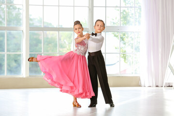 Cute little children dancing in studio