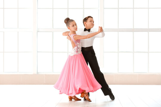 Cute little children dancing in studio