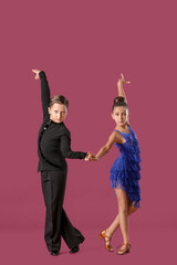 Cute little children dancing against color background