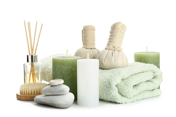 Spa composition with aroma candles on white background