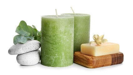 Spa composition with aroma candles on white background