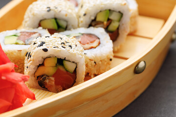 Japanese sushi roll on plate close up