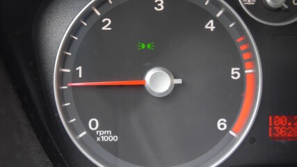 Fototapeta premium Tachometer Gauge of Starting and Stopping Car Close Up