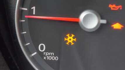 Tachometer Gauge of Starting and Stopping Car Close Up