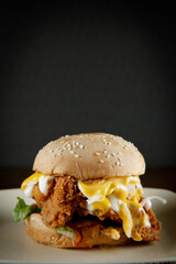 super delicious burger with melted cheese and french fries