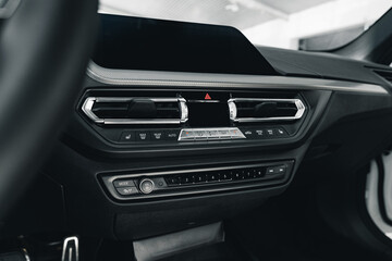Obraz na płótnie Canvas Buttons panel of the car on the dashboard