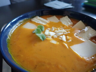 fresh warm pumpkin soup in a bowl