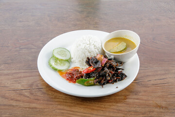 a plate of nasi berlauk