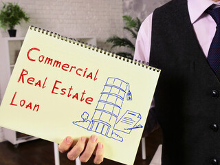 Conceptual photo about Commercial Real Estate Loan with written text.